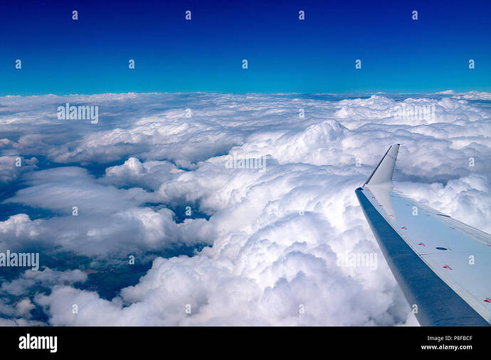 view-of-clouds-in-the-sky-from-a-lufthansa-plane-flying-from-munich-to-trieste-photo-by-enrique-shore-P8FBCF