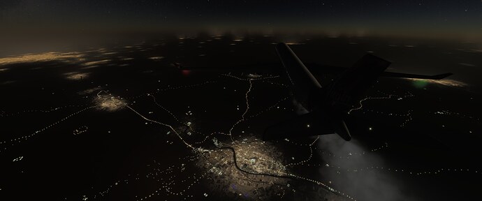Flying over a city at night
