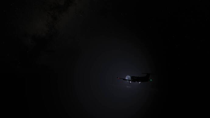 a plane with it's lights on, it's night, foggy, and you can just make out the milky way in the sky and some water below