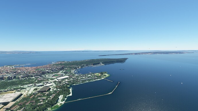 A farther away view of the island (on the right) and the marina (in the middle)