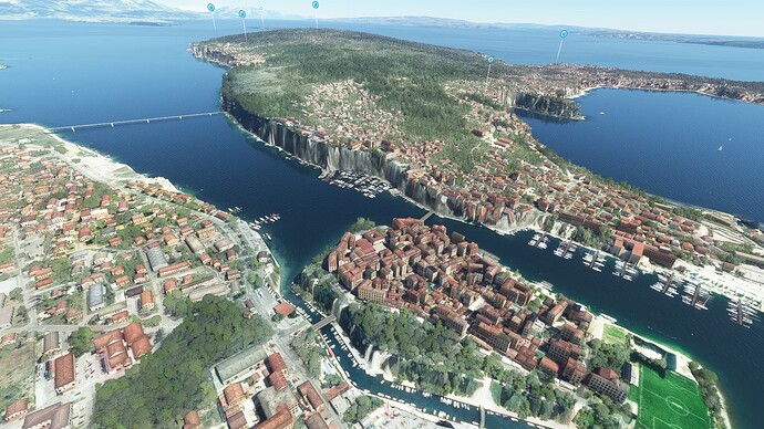 Old Trogir is inaccessible, the only bridge end where the elevation seems correct is north end of most hrvatskih branitelja (farthest one, on the left)